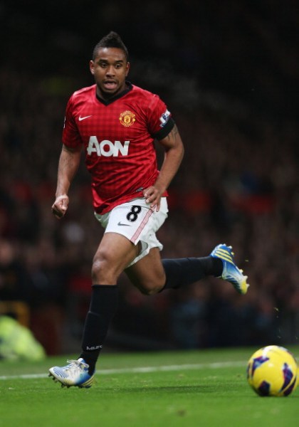 推动田径运 推动田径运